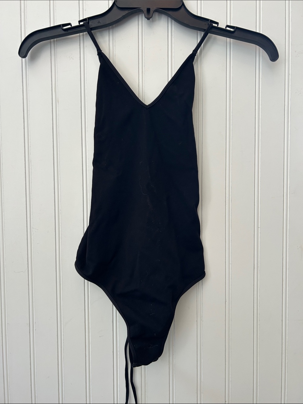 NIKIBIKI Black V-Neck One-Piece Bodysuit